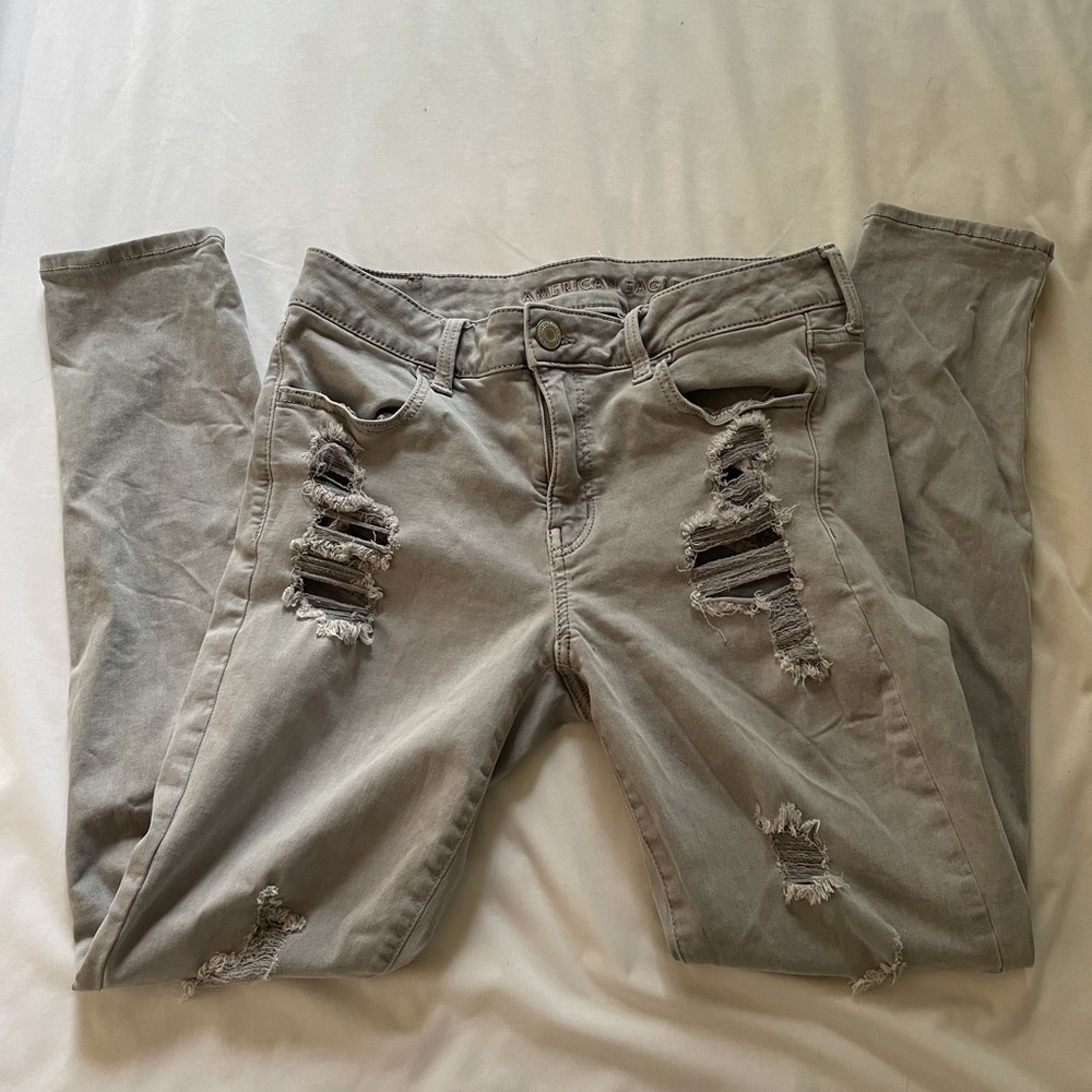 American Eagle gray ripped jeans. size 12.